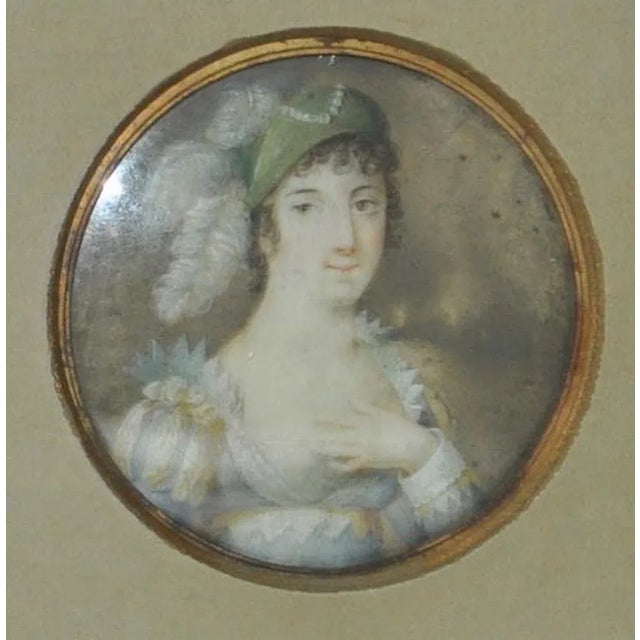 Framed 19th Century Portrait Miniature of Woman w/ Elaborate Headdress Detailed portrait miniature of an elegant young...