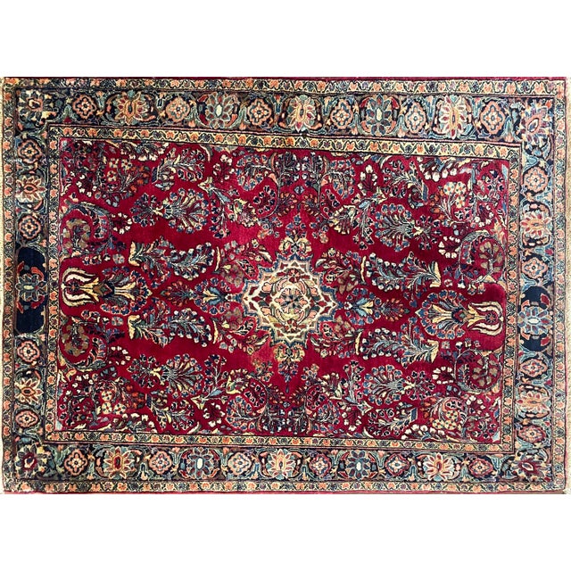 This exceptional antique Persian Mohajeran Sarouk rug, measuring approximately 3'3" x 5' and dating to around 1920, is a...