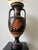 Classically inspired Ancient Greek style urn or Amphora with twin handles. Large scale with beautifully painted figures on...