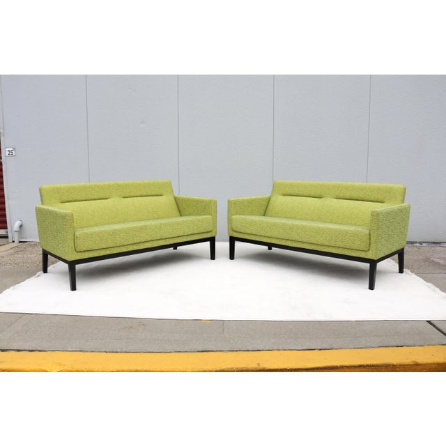 Fabulous pair of Passerelle two-seat lounge sofas/loveseats by Coalesse. These mid-century modern inspired sofas showcase...