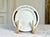 A rare vintage porcelain plate made for the legendary Hôtel de Crillon in Paris, featuring the distinctive black-and-gold...