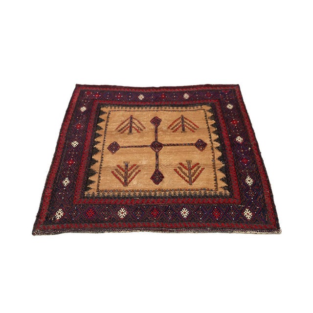 This early 1900s Sofreh Kilim is a rare and collectible gem. Measuring a unique 3'9" x 4'1" it stands out for its compact...