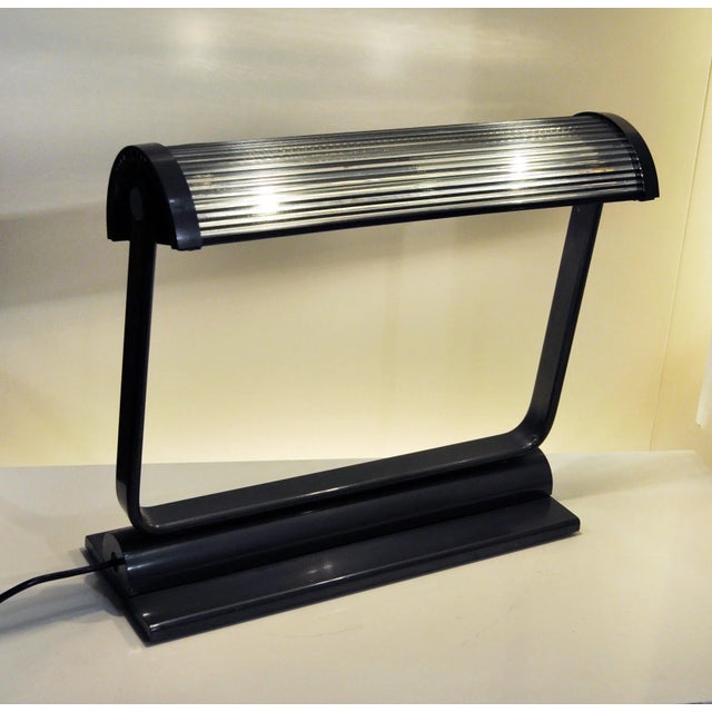 - Table lamp in metal and glass - Designed by Alberto Fraser - Manufactured by Artemide in the 1980s Up to 250V (Europe/UK...