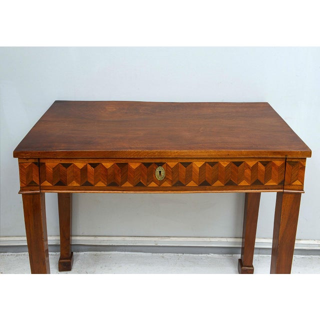 Finely crafted antique Northern Italian parquetry console. The parquetry work consist of several different types of wood —...