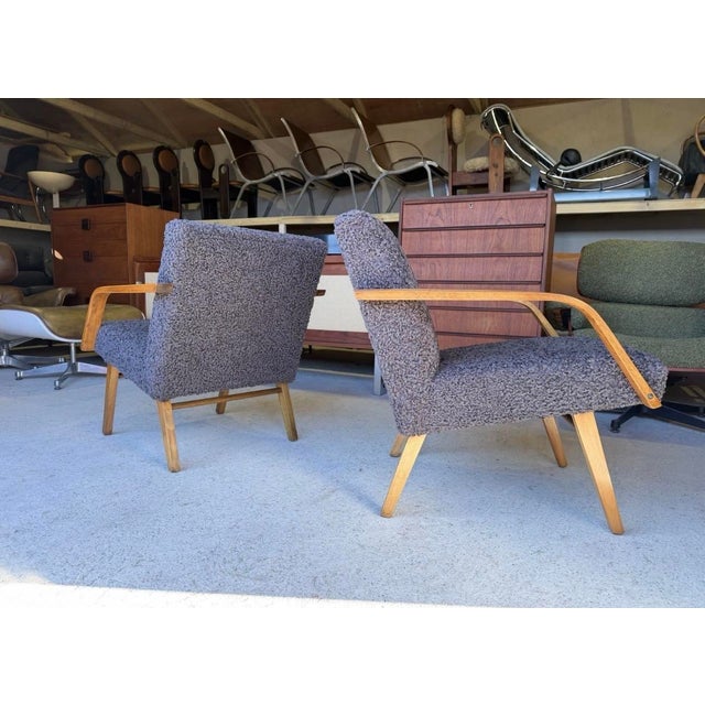 These unique looking bentwood armchairs are fully refurbished with brand new upholstery in a fluffy/cosy dark grey fabric....