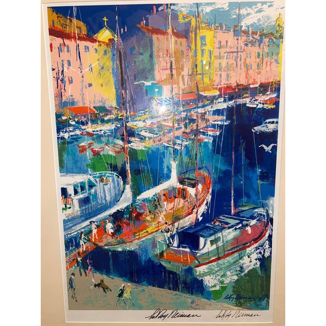 Vibrant framed LeRoy Neiman “St. Tropez” serigraph, dated 1995, depicting a lively marina scene at Saint-Tropez with...