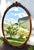 Vintage (1940's) Wall Mirror has a French Style. The Wood is Satinwood. Carved Wood Frame. Oval Shape with Basket Crest....