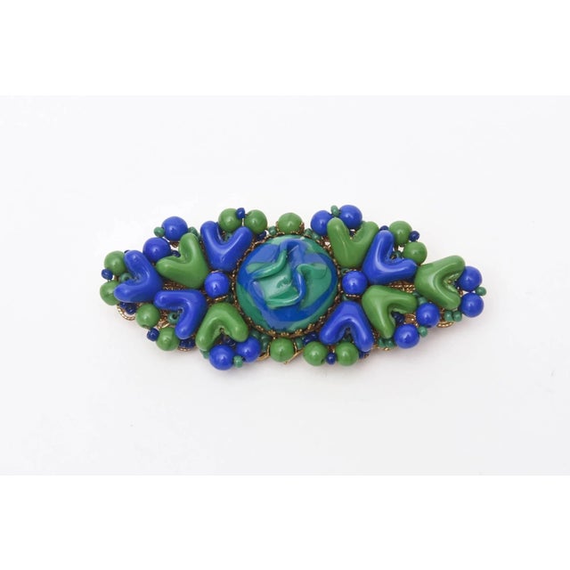 This is part of Chairish’s Costume Jewelry assortment. The gorgeous play of brilliant hues of blue and green make this...