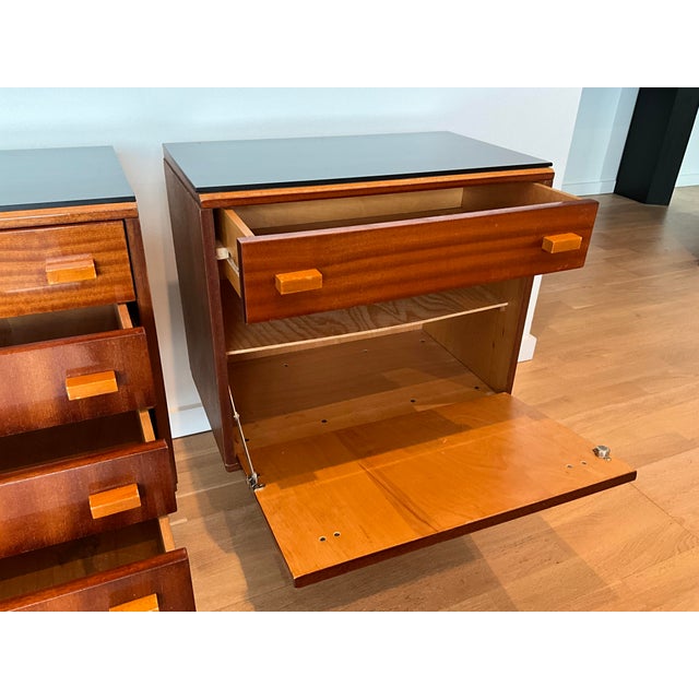 Frantisek Mezulanik bedside tables from 1979 are fully assembled and made of wood with a glass tabletop. These elegant...