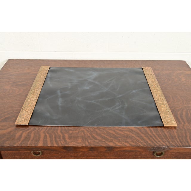 A gorgeous pair of Art Deco or Arts & Crafts period bronze blotter ends featuring symbols of the Zodiac, with a custom...