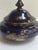Decorative ceramic porcelain cobalt blue round vase jar dates back to mid-20th century with hand painted colorful peacock...