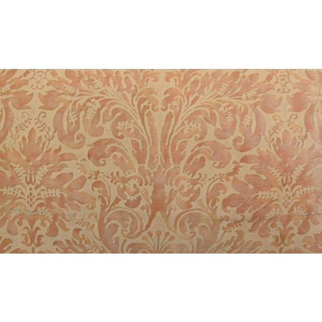 Custom-tailored pillow in Italian Mariano Fortuny cotton fabric called "Lucrezia" in a melon, orange, and cream colorway....