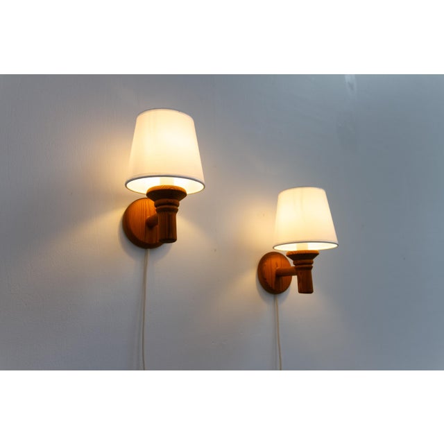 Scandinavian Pine Wall Sconces by Darø, 1970s. Set of 2. Lovely pair of Danish wall lamps in solid Nordic pine.Made in the...