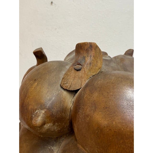 Beautiful solid wood statue in good vintage condition signed by the artist