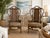 Beautiful vintage pair of high back arm chairs featuring bent rattan frames, woven wicker panels, decorative wrapped...