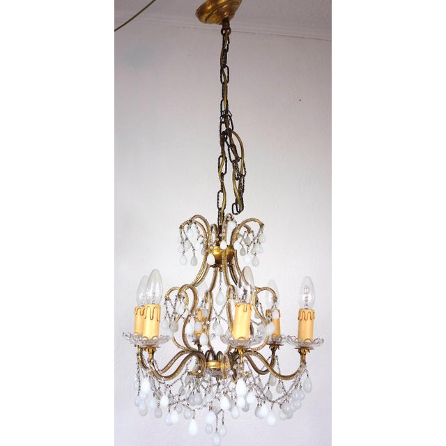 Antique Gilded Metal and Murano Glass Drop Chandelier, 1920s, in Very Good conditions. Designed 1920 to 1949 I have...