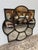 Design Plus Gallery presents a Nailhead Studded Wall Mirror in Flower Shape and Medieval Revival Style. The mirror has...