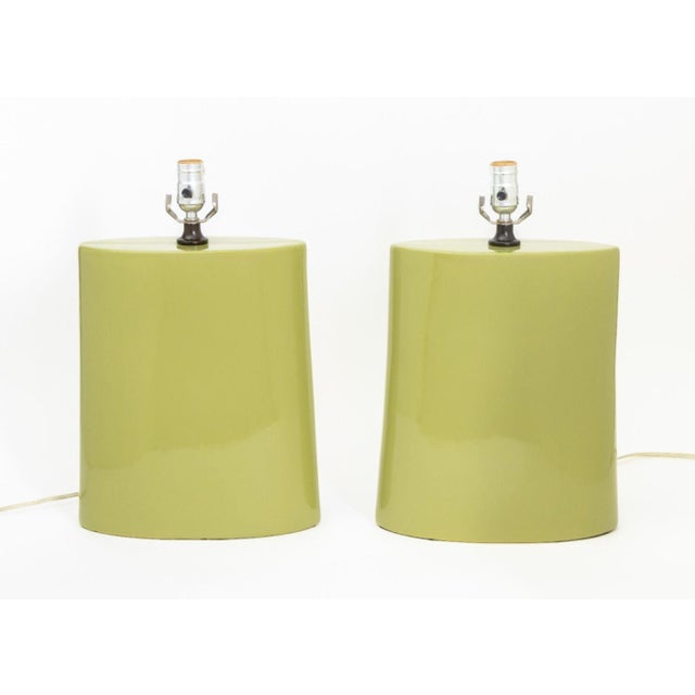 Pair of Modernist Lime Green Glazed Ceramic Lamps, apparently unmarked. 18" H x 11" W x 4" D. Provenance: From a 45 Sutton...
