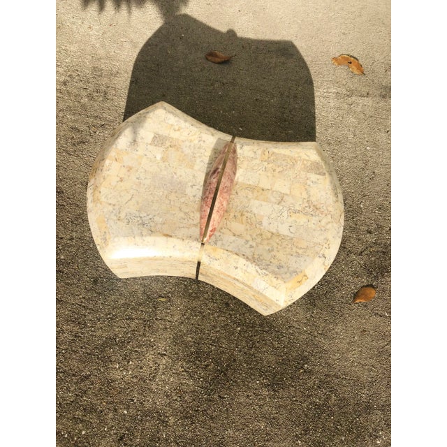 Stunning Maitland-Smith beige tessellated stone box with a rose-pink handle. There is a brass inlay through the mid-line...