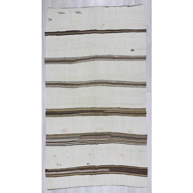 Handwoven vintage striped hemp kilim rug from Yozgat region of Turkey. Approximately 50-60 years old. In very good condition