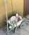 Charming Market Cart in original blue gray paint. Use it indoors or outdoors for plants, toys, other storage.
