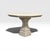 A classic dining table from Michael Taylor. Suitable for indoor or outdoor use, the table has a traditional limestone...