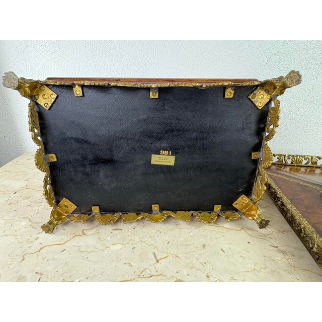 This is a handsome tooled leather box by Maitland Smith. This large dresser box is covered in brown leather with...