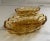 This pair of gorgeous vintage amber glass divided oval dishes was made by Anchor Hocking in the 1960s. A lovely gold hue,...