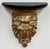 Unique vintage gilded and black painted wooden picture wall shelf with majestic lion head design. Plate channel on top....
