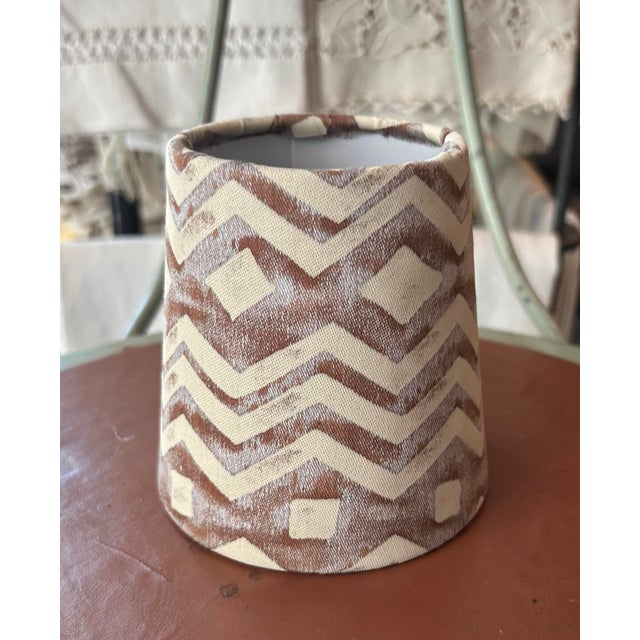 A cliptop chandelier shade handmade from Fortuny’s icon printed fabric measurement top 3” bottom 4” side 4”
