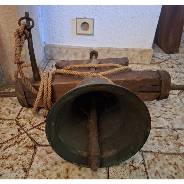 Antique Bronze Bell on Wooden Yoke and Wrought Iron Fittings, 1700s, in Good conditions. Designed before 1890