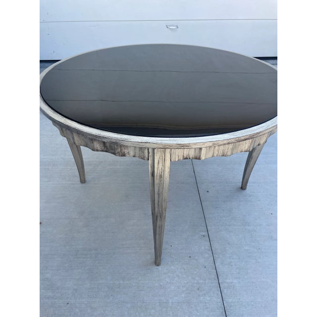 Italian made dining table , cabriole legs , silver gilt finish , inset black glass top