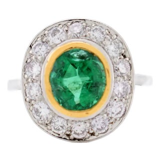 Circa 1935 Halo Ring, Art Deco Era, Natural Emerald and Diamonds, French Platinum For Sale