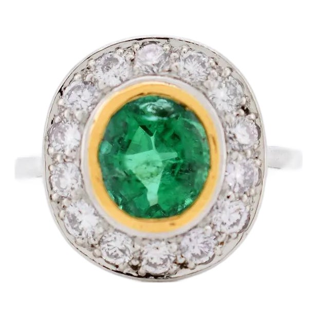 Circa 1935 Halo Ring, Art Deco Era, Natural Emerald and Diamonds, French Platinum For Sale