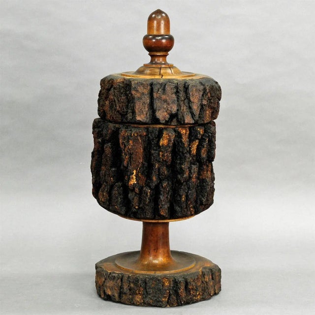 A very large highly decorative rustic wooden humidor turned out from a solid thunk, tin inset. Executed, circa 1950...