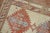 An early 20th century Persian Serab rug with a large scale tribal design on a soft camel colored ground. Accents in brown,...