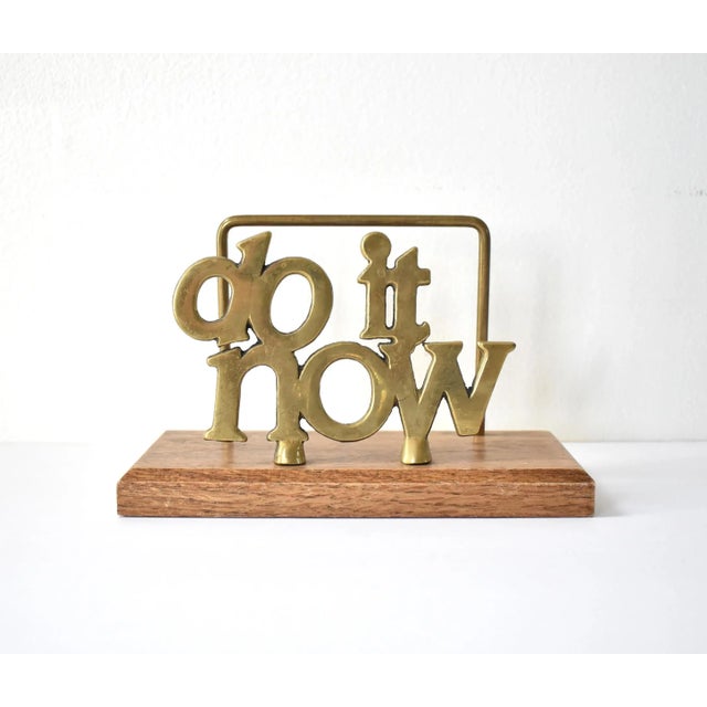 A vintage brass and wood letter holder or bill organizer, "Do it Now. 8.5"x4"x5.25".
