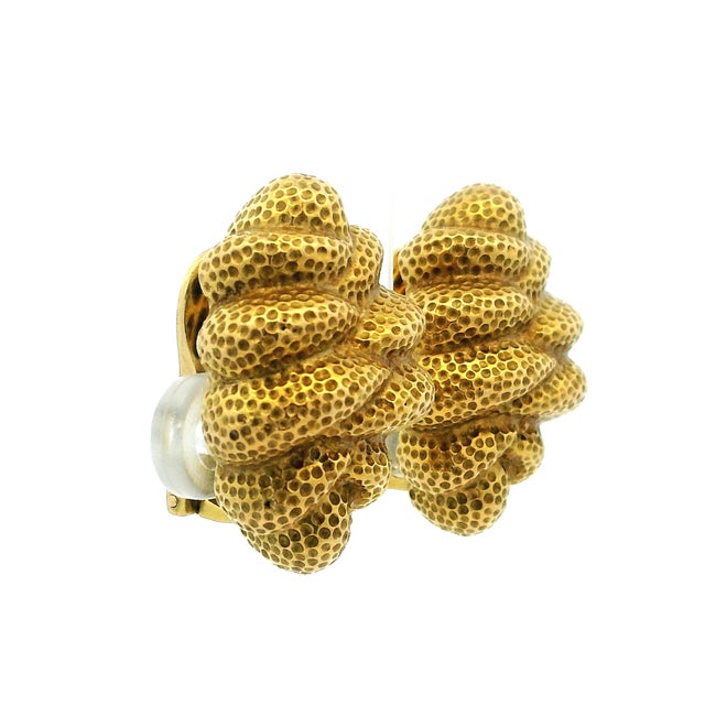 A beautifully sculptural pair of vintage 18K yellow gold clip-on earrings, designed in the bold organic style of the...
