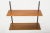 Vintage Walnut Shelving System from Sparrings, 1960s, in Very Good conditions. Designed 1960 to 1969 This piece has an...