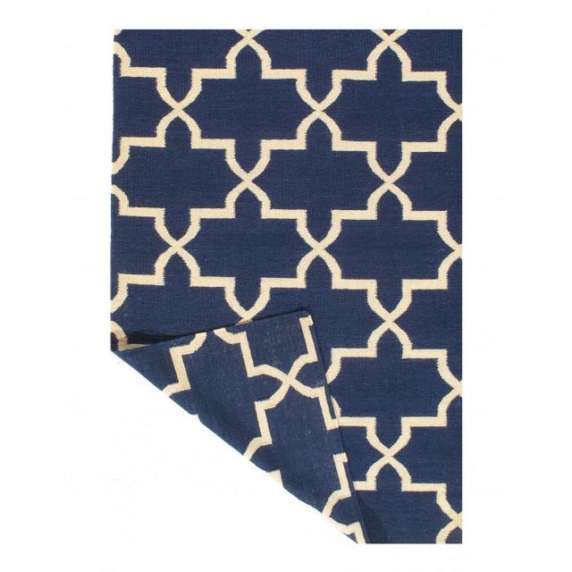 Flat-woven of wool to showcase their delightful designs this collection instantly transforms any space into a wanderlust...