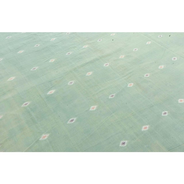 Vintage Indian Dhurrie green rug Size: 16'0" × 17'9" (487 × 541 cm). Elegant in its simplicity yet rich in traditional...