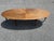 This elegant surfboard-style coffee table was meticulously crafted from walnut, it features a distinctive base with...