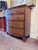 This antique Georgian chest of drawers showcases a beautifully shaped bow front façade crafted in rich mahogany,...