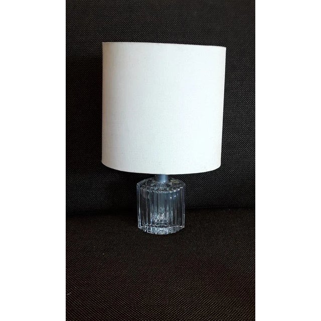 Vintage German Table Lamp with a Hand-Polished Crystal Glass Foot with a Cream-Colored Fabric Screen, 1970s, in Good...