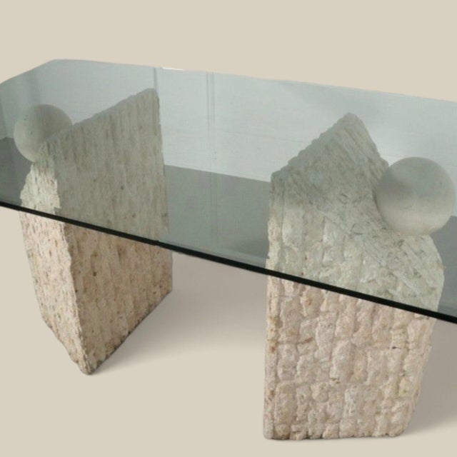 Bring timeless design into your home with this Postmodern Mactan Stone dining table featuring a sleek rectangular glass...
