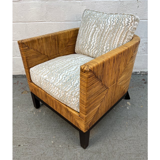 Bring a sophisticated touch of coastal modernism into your home with the Braxton Culler Geometric Woven Wicker Lounge...