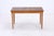 Vintage dining table with clean, straight lines and gently tapered legs. The table can be extended on both sides, offering...