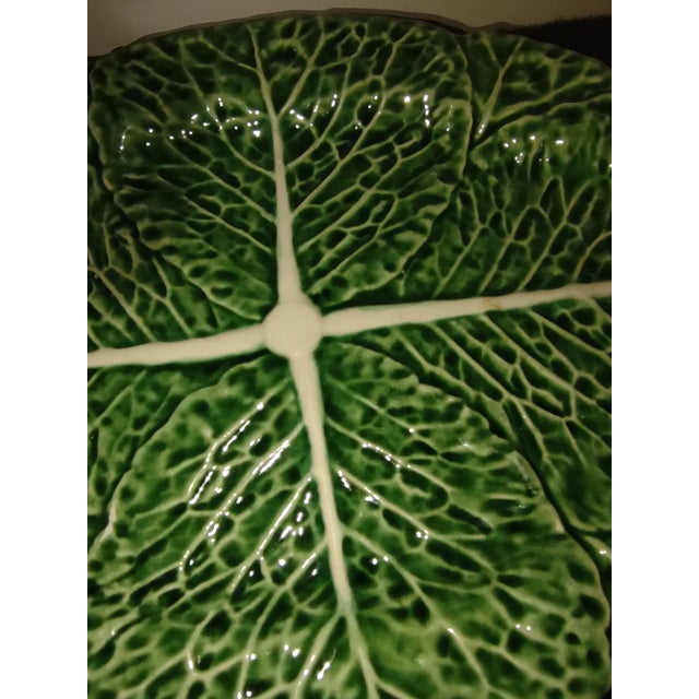 Matched pair of medium sized oval serving platters in green cabbage by Bordallo Pinheiro of Portugal. Food always looks so...