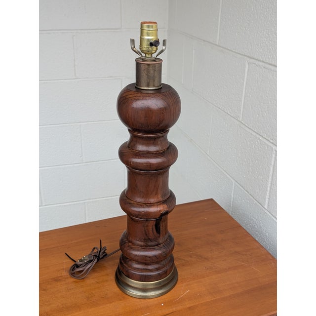 Elevate your home with the timeless sophistication of this authentic Ethan Allen turned wood table lamp. Expertly crafted...