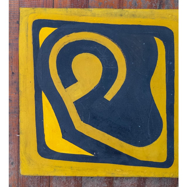 We are selling this funky little Mid-Century Modern yellow and black abstract painting. The back of the painting is signed...